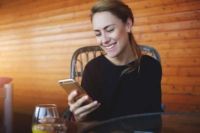 Woman holding smartphone