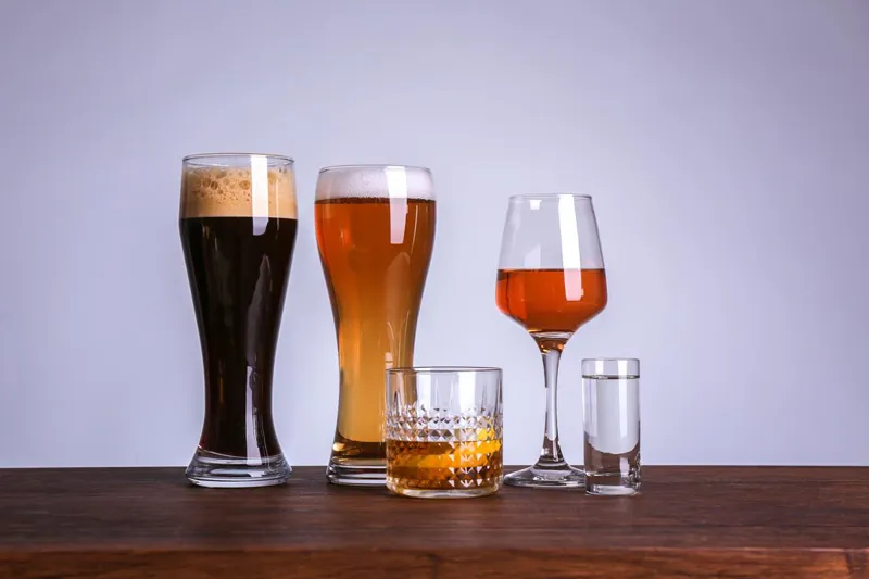A variety of drinks sitting on a table