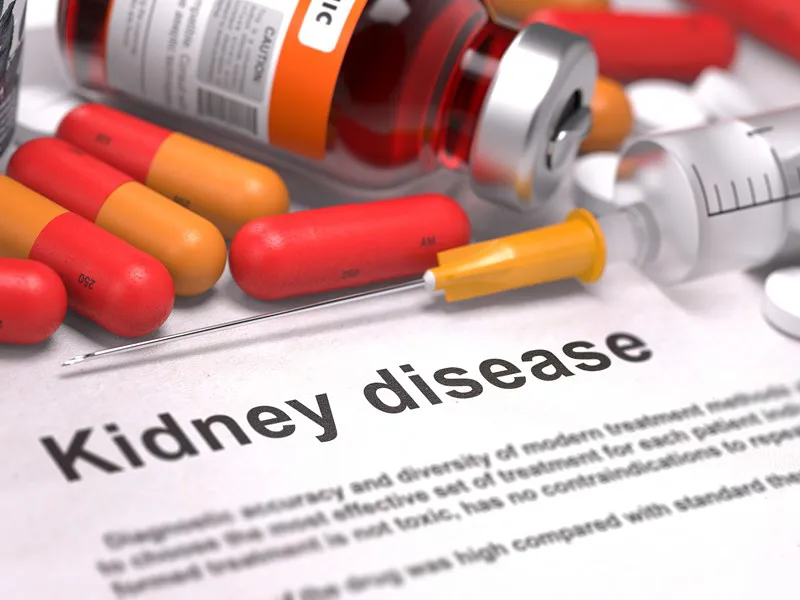 Kidney disease report with medication and a syringe