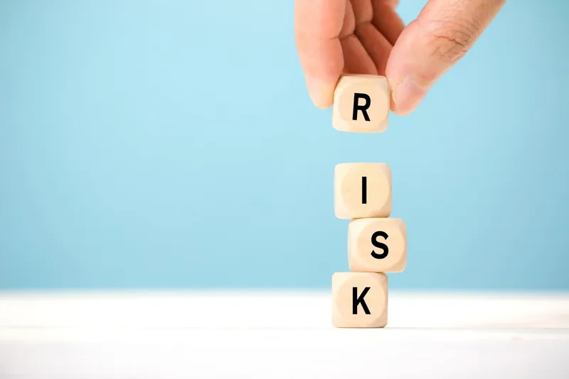 Prevention - Wooden blocks spelling the word risk