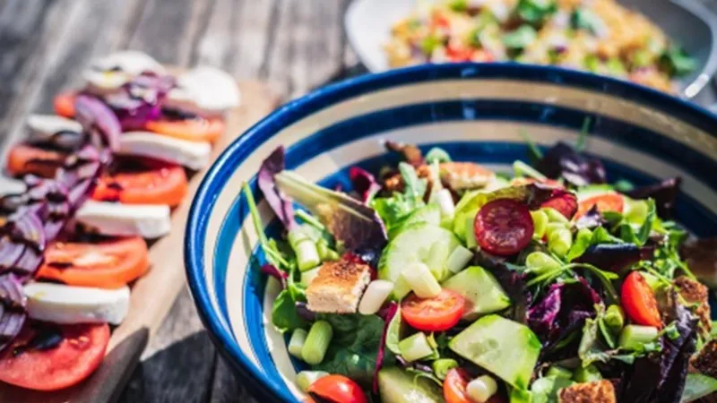 Healthy snacking - preparing fresh food at a kitchen counter