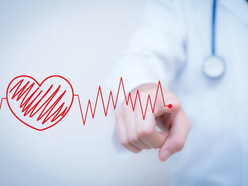 Clinician drawing a heart and heartbeat line