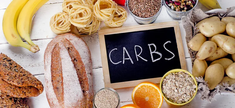 best-sources-of-carbs-on-a-white-wooden-background (old site media 3240)