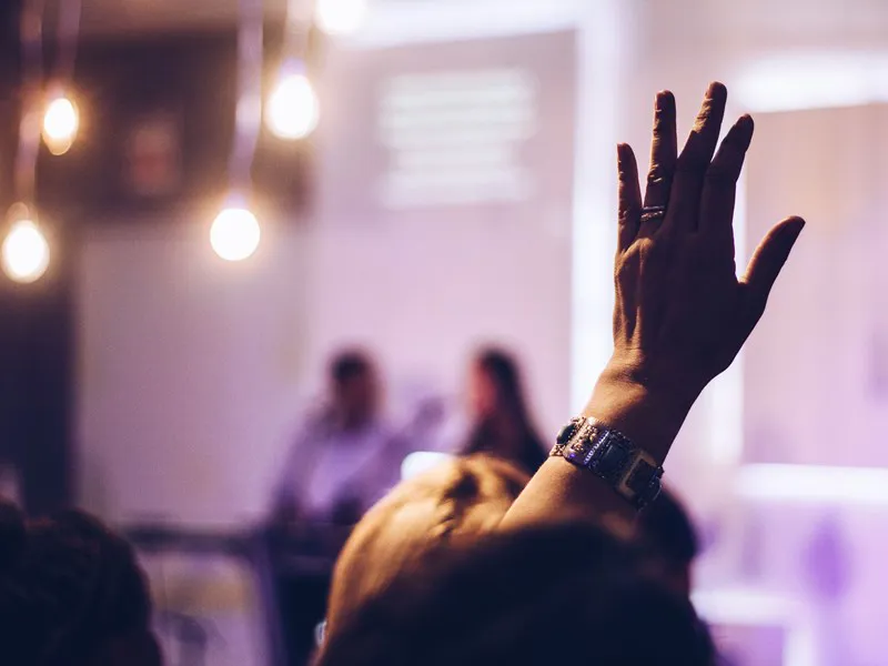 Raised hand at a lecture