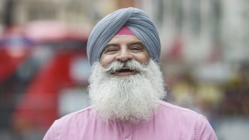 0-1a-portrait-indian-man-smiling (old site media 4286)