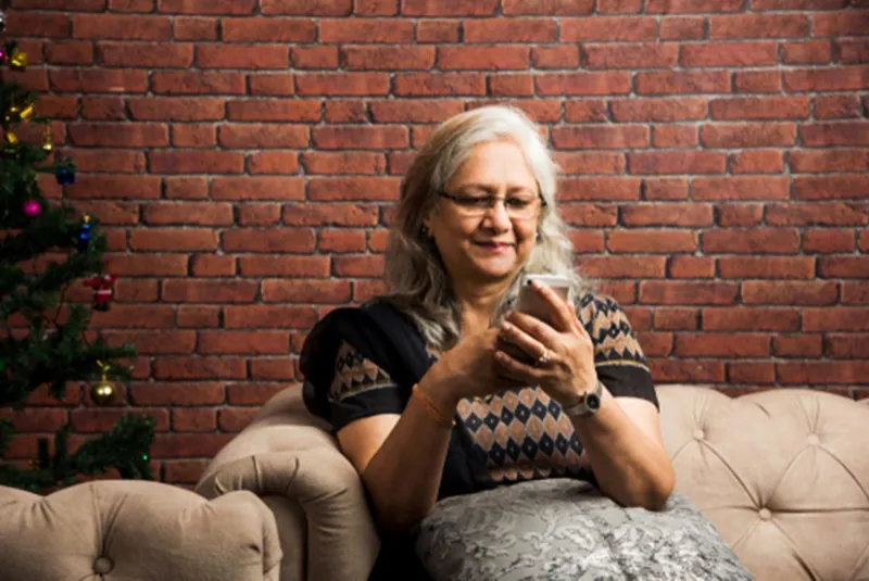 Woman recording a video on her phone